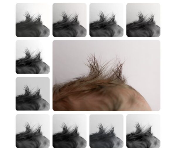 Photoshop actions applied to macro shot of newborn baby hair in black and white